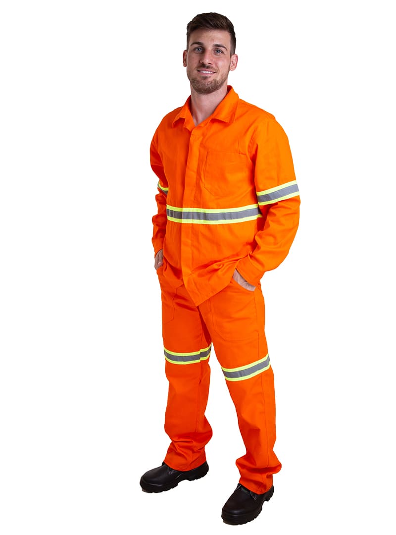 Worker wearing a high-visibility orange flame-resistant coverall with reflective striping.